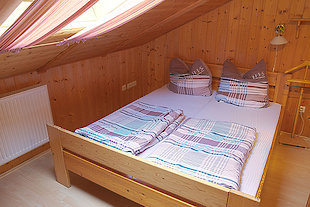 Schlafzimmer im Ferienhaus Englmar in Bayern